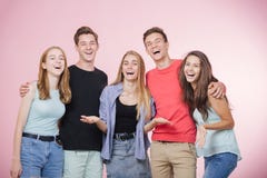 Happy smiling young group of friends standing together talking and laughing. Best friends stock photography Happy smiling young group of friends standing together talking and laughing. Best friends stock photography