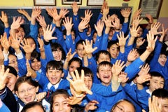 Happy students in the classroom Stock Image