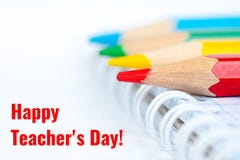 Happy teacher`s day, greetings card with colorful pencils