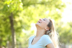 Happy teenage girl laughing breathing fresh air stock photo Happy teenage girl laughing breathing fresh air stock photo