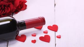 Happy Valentine`s Day With Red Wine, Red Roses, White Background And Hearts Stock Image