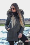 Happy woman. Beautiful blonde girl, model, walks near the sea. La Diga, Veneto, Italy royalty free stock photography Happy woman. Beautiful blonde girl, model, walks near the sea. La Diga, Veneto, Italy royalty free stock photography