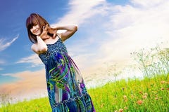 Happy woman in a meadow stock images Happy woman in a meadow stock images