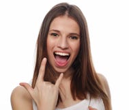 Happy woman poiting finger up at copyspace isolated on a white royalty free stock photography Happy woman poiting finger up at copyspace isolated on a white royalty free stock photography