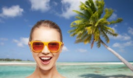 Happy woman or teenage girl in sunglasses on beach stock photos Happy woman or teenage girl in sunglasses on beach stock photos
