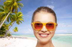Happy woman or teenage girl in sunglasses on beach royalty free stock images Happy woman or teenage girl in sunglasses on beach royalty free stock images
