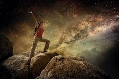 Happy woman traveler standing on top of a mountain and enjoying Royalty Free Stock Photos Happy woman traveler standing on top of a mountain and enjoying Royalty Free Stock Photos