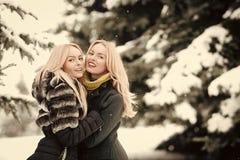 Happy women hugging outdoors on winter day royalty free stock photo Happy women hugging outdoors on winter day royalty free stock photo