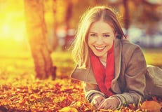 Happy Young Beautiful Woman In The Autumn Royalty Free Stock Image Happy Young Beautiful Woman In The Autumn Royalty Free Stock Image
