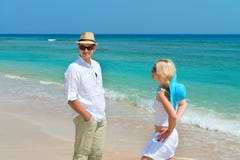 Happy young couple enjoying at beach stock image Happy young couple enjoying at beach stock image