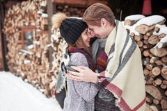 Happy Young Couple in Winter Park having fun.Family Outdoors. royalty free stock photography Happy Young Couple in Winter Park having fun.Family Outdoors. royalty free stock photography