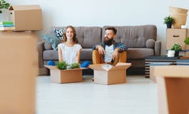 Happy young married couple moves to new apartment royalty free stock image Happy young married couple moves to new apartment royalty free stock image