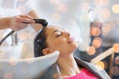 Happy young woman at hair salon royalty free stock photo Happy young woman at hair salon royalty free stock photo
