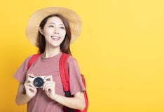 Happy young woman in summer hat and holding camera royalty free stock image Happy young woman in summer hat and holding camera royalty free stock image
