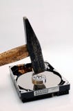 Hard Disk And A Hammer Royalty Free Stock Photos