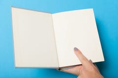 Hardcover book mockup, brochure in hands stock images Hardcover book mockup, brochure in hands stock images