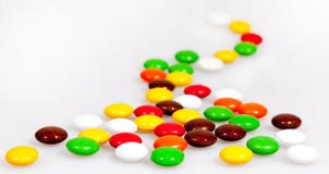 Haricot coloré de sucrerie de chocolat sucré images libres de droits Haricot coloré de sucrerie de chocolat sucré images libres de droits