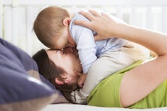 Harmonious time: Mother and son embracing with love and tenderne Stock Photo Harmonious time: Mother and son embracing with love and tenderne Stock Photo