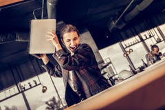 Angry office worker going to throw her laptop royalty free stock photos Angry office worker going to throw her laptop royalty free stock photos