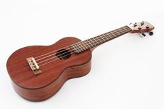 Hawaiansk gitarr för ukulele på vit bakgrund fotografering för bildbyråer Hawaiansk gitarr för ukulele på vit bakgrund fotografering för bildbyråer