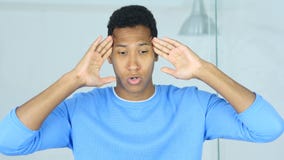 Headache, Upset Tense Young Afro-American Man stock photography Headache, Upset Tense Young Afro-American Man stock photography