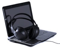 Headphones And Laptop On White Background Royalty Free Stock Photo