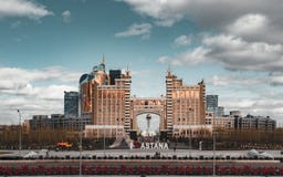 Headquarters head office of the KazMunaiGas in Astana Kazakhstan with Bayterek Tower in Background stock photos Headquarters head office of the KazMunaiGas in Astana Kazakhstan with Bayterek Tower in Background stock photos