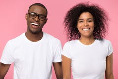 Headshot portrait african millennial coupe laughing looking at camera stock images Headshot portrait african millennial coupe laughing looking at camera stock images