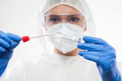 Healthcare professional holding Coronavirus COVID-19 test kit equipment