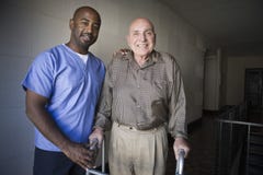 Healthcare Worker With Elderly Man Royalty Free Stock Image