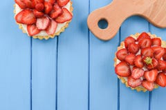 Healthy dessert with seasonal berries. Tratlets decorated with f royalty free stock photography Healthy dessert with seasonal berries. Tratlets decorated with f royalty free stock photography