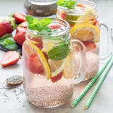 Healthy detox chia seed drink with strawberry, lemon and mint in glass jar, square format royalty free stock photography Healthy detox chia seed drink with strawberry, lemon and mint in glass jar, square format royalty free stock photography