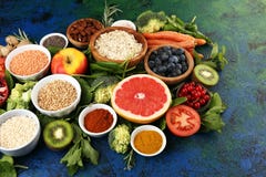Healthy Food Clean Eating Selection: Fruit, Vegetable, Seeds, Superfood, Cereals, Leaf Vegetable On Rustic Background Royalty Free Stock Image