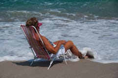 Healthy, Mature Woman Relaxing On A Florida Beach Stock Photo