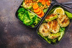 Healthy Meal Prep Containers With Green Burgers, Broccoli, Chickpeas And Salad Royalty Free Stock Photography