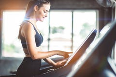 Healthy People running on machine treadmill at fitness gym, Work royalty free stock photo Healthy People running on machine treadmill at fitness gym, Work royalty free stock photo
