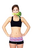 Healthy young woman eating broccoli royalty free stock photo Healthy young woman eating broccoli royalty free stock photo