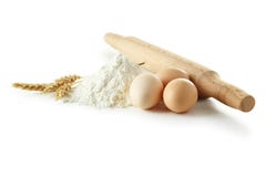 Heap Of Wheat Flour With Eggs, Rolling Pin And Spikelets Isolate Royalty Free Stock Photography Heap Of Wheat Flour With Eggs, Rolling Pin And Spikelets Isolate Royalty Free Stock Photography