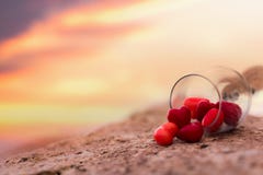 The heart candy flow out of glass royalty free stock photo The heart candy flow out of glass royalty free stock photo