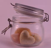 Heart shaped soap in a transparent glass jar royalty free stock photos Heart shaped soap in a transparent glass jar royalty free stock photos