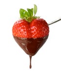 A heart shaped strawberry dipped in chocolate fon