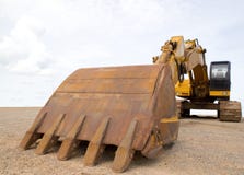 Heavy Duty Construction Equipment Parked at Worksite Royalty Free Stock Photo Heavy Duty Construction Equipment Parked at Worksite Royalty Free Stock Photo