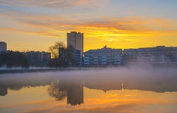 Heavy fog on water in morning city park Stock Photo Heavy fog on water in morning city park Stock Photo