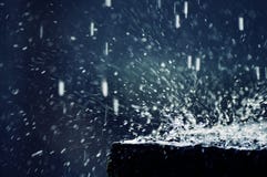 Heavy rain and water drops splashing, in motion, nature power