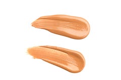 Heller beige Make-upabstrich der sahnigen Grundlage lokalisiert auf weißem Hintergrund Helle beige sahnige Grundlagenbeschaffenhe lizenzfreies stockfoto Heller beige Make-upabstrich der sahnigen Grundlage lokalisiert auf weißem Hintergrund Helle beige sahnige Grundlagenbeschaffenhe lizenzfreies stockfoto
