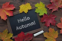 Hello autumn text on chalkboard stock image Hello autumn text on chalkboard stock image