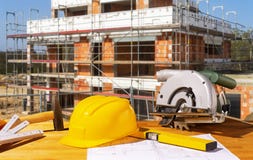 Helmet and tools on a construction site Stock Photography Helmet and tools on a construction site Stock Photography