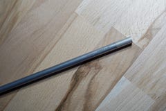 Helsinki, Finland - March 28, 2019: Straw made of titanium metal for sustainable purposes and not using plastic ones royalty free stock image Helsinki, Finland - March 28, 2019: Straw made of titanium metal for sustainable purposes and not using plastic ones royalty free stock image