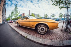 Helsinki, Finland - May 16, 2016: Old car Ford Mustang. distortion perspective fisheye lens royalty free stock photos Helsinki, Finland - May 16, 2016: Old car Ford Mustang. distortion perspective fisheye lens royalty free stock photos
