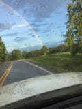 Het bekijken een regenboog royalty-vrije stock foto Het bekijken een regenboog royalty-vrije stock foto